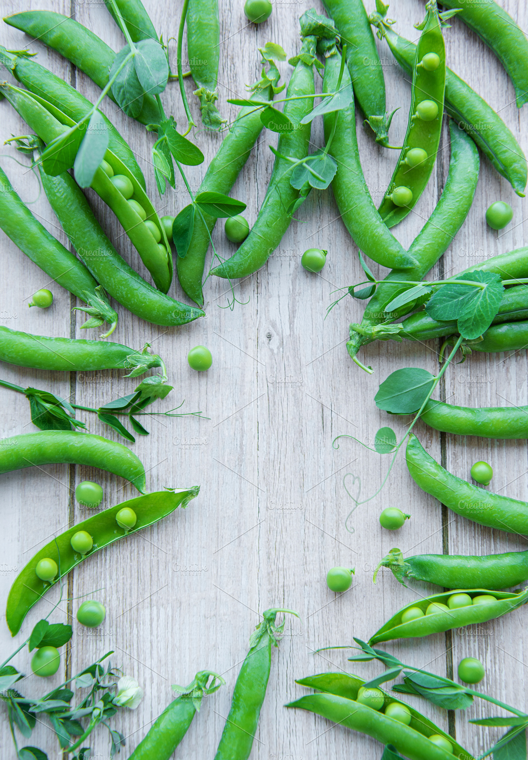Green peas with leaves, a Food & Drink Photo by Olena Rudo