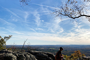 Hiker on rocky overlook at Garden of the Gods with blue sky in Colorado Springs, a Nature Photo by AS photostudio