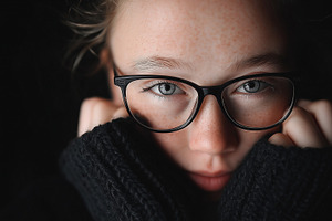 Young girl with blue eyes, freckles, a Person Photo by MistyDay