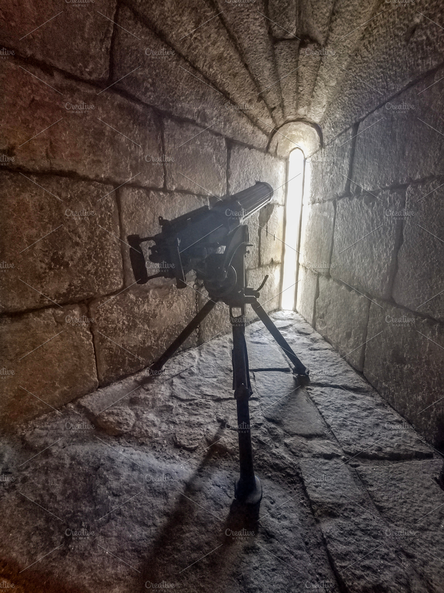Stone corridor with cannon and narrow light slit, an Architecture Photo by DanFLCreativo