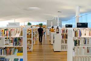 Modern library with books, a School & Education Photo by BOOCYS