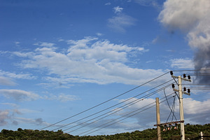 Power Lines Stretching Across the Bl, an Industrial Photo by bastera