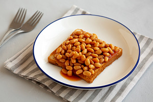 Homemade English Beans on Toast, side view., a Food & Drink Photo by LiudmylaChuhunova