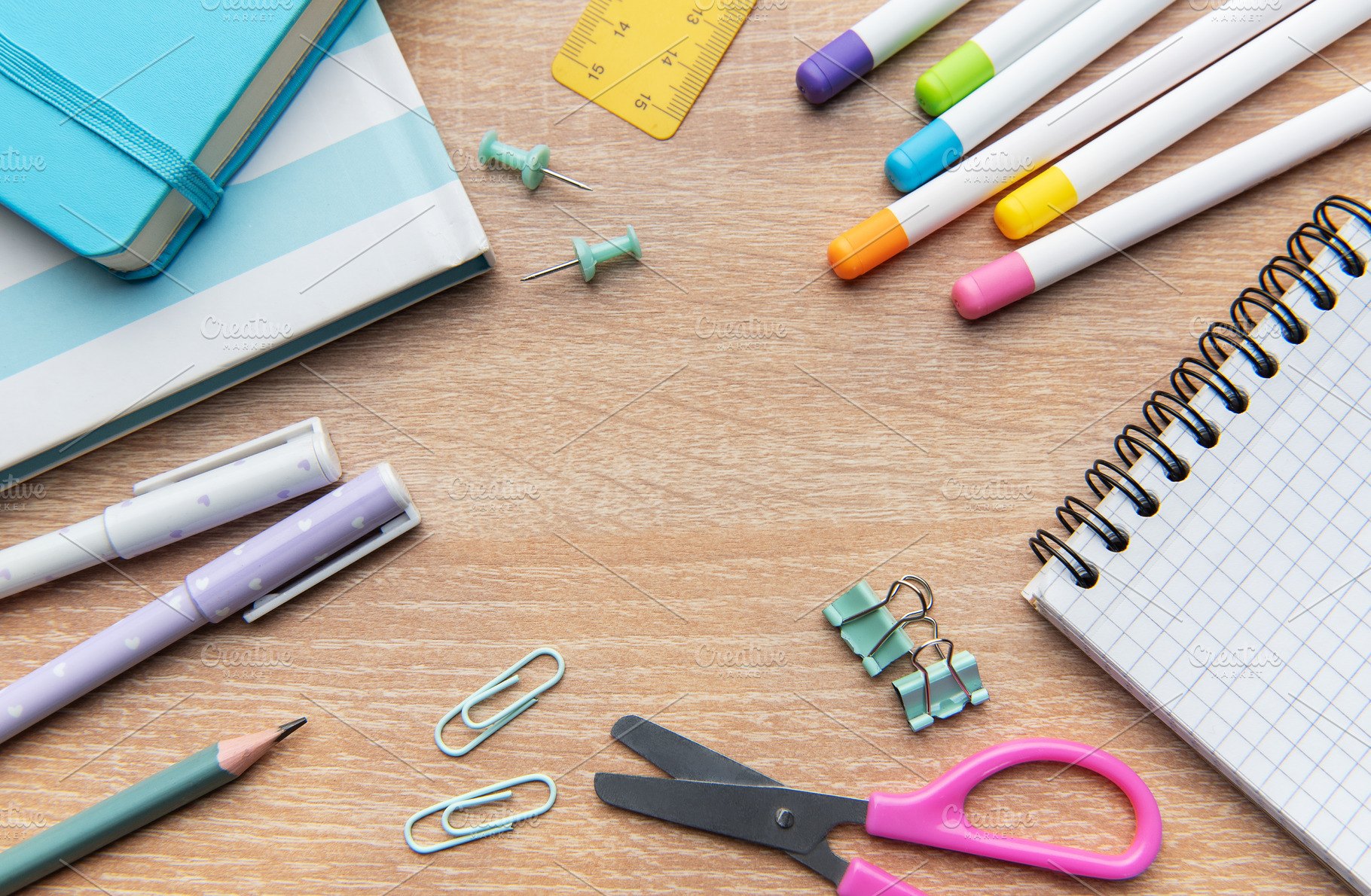 Colorful school and office supplies on wooden desk, a School & Education Photo by Olena Rudo