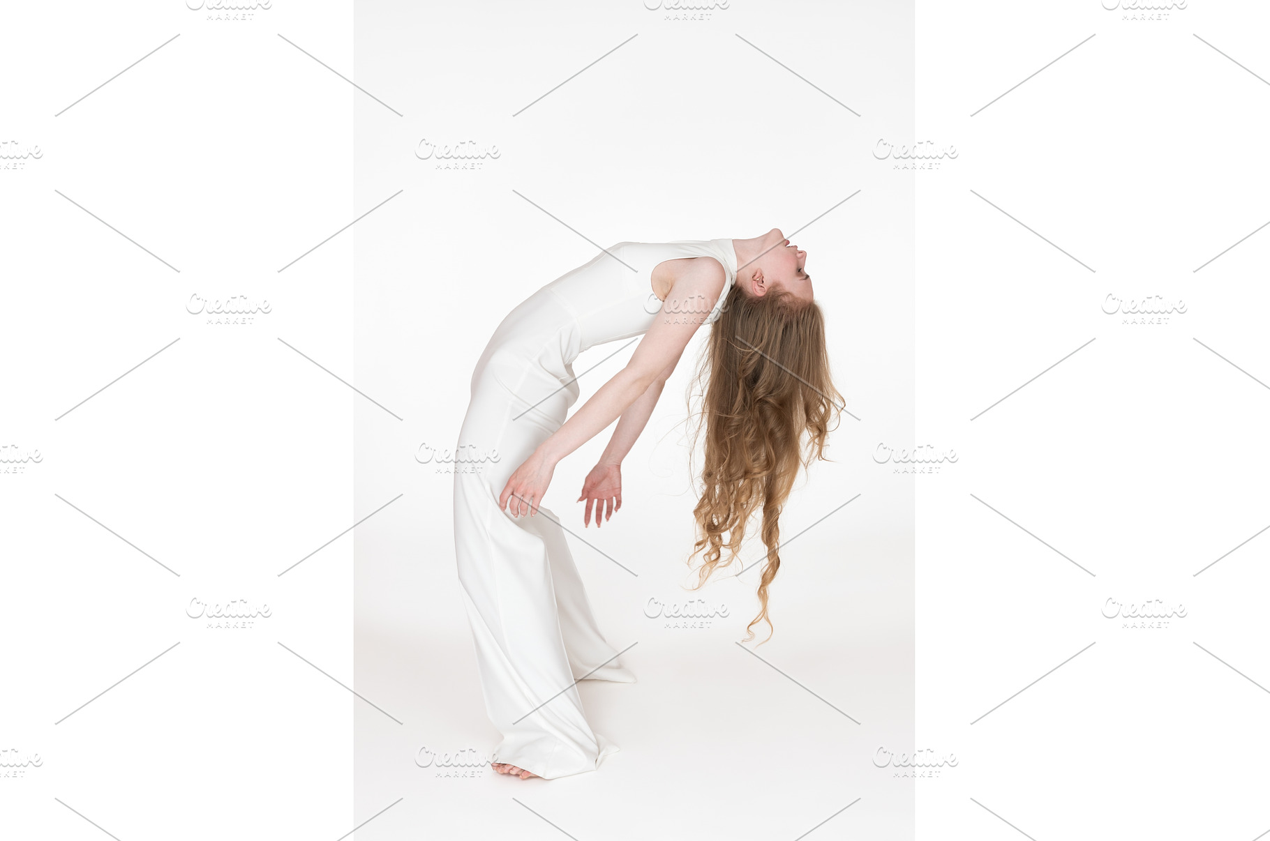 Flexible young blonde woman dancer, a Person Photo by Alexander-Piragis