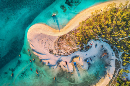 Aerial view of the fishing boats stock photo containing beach and sea, a Nature Photo by den-belitsky