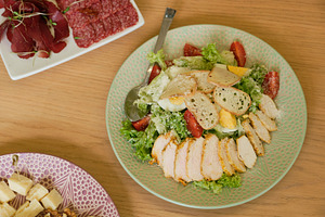 Classic Caesar salad with grilled chicken breast, boiled eggs and croutons on g, a Food & Drink Photo by Rohan Photography