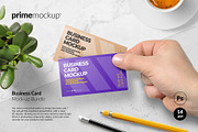 Business Card in a hand Mockup, a Print Template by PrimeMockup (Thumbnail 1 of 12)