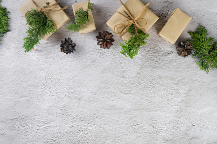 Christmas still life. Xmas Gift in craft paper with pine cones,, a Holiday Photo by vimart