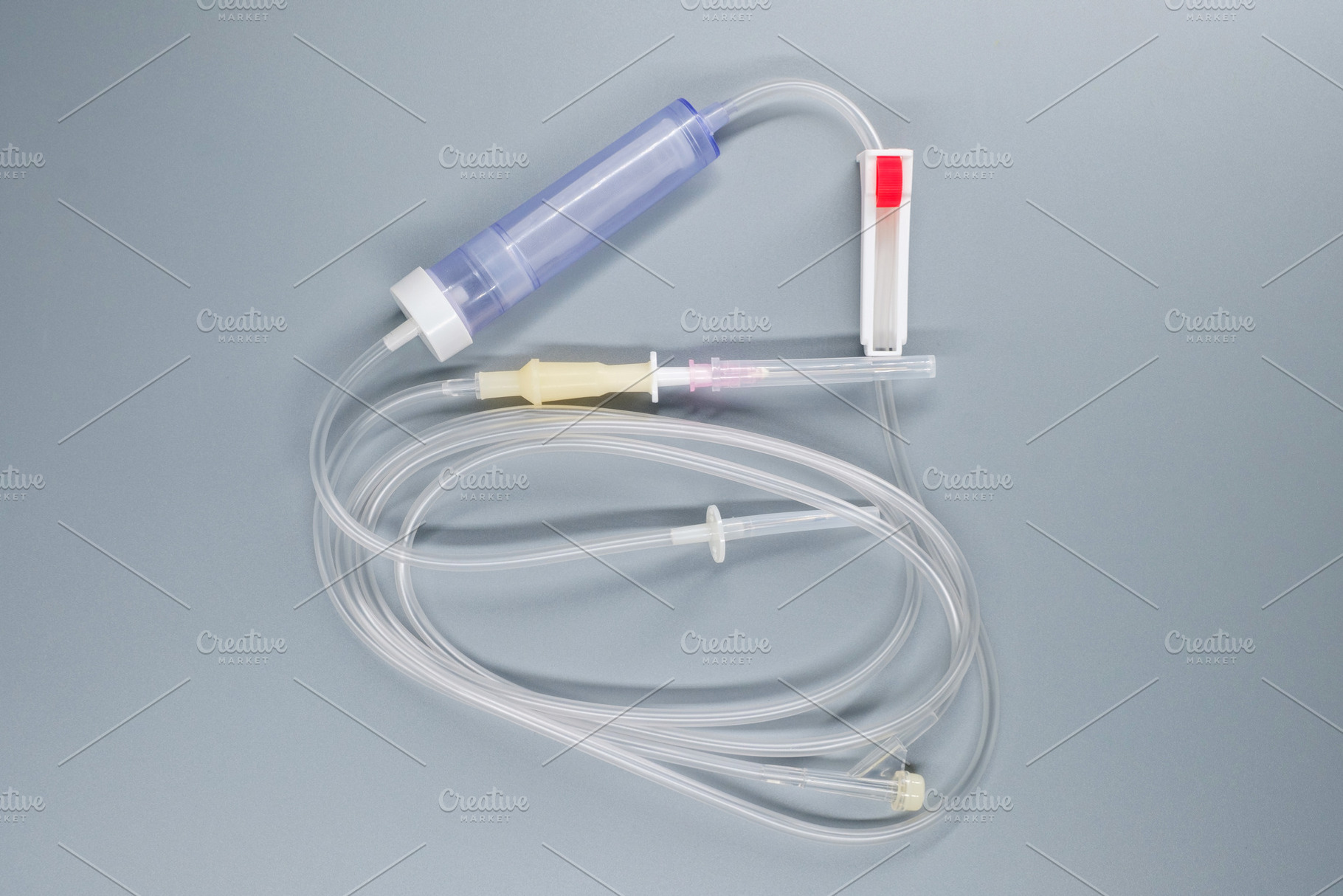 Infusion set Luer Slip TS-AD with metal spike for intravenous therapy. Professi, a Health & Medical Photo by Rohan Photography