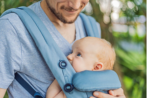 Young father walks in nature with, a Person Photo by Elizaveta Galitskaya