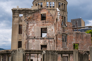 Genbaku Dome ruins at Hiroshima Peace Memorial under a cloudy sk, an Architecture Photo by GoodGoods