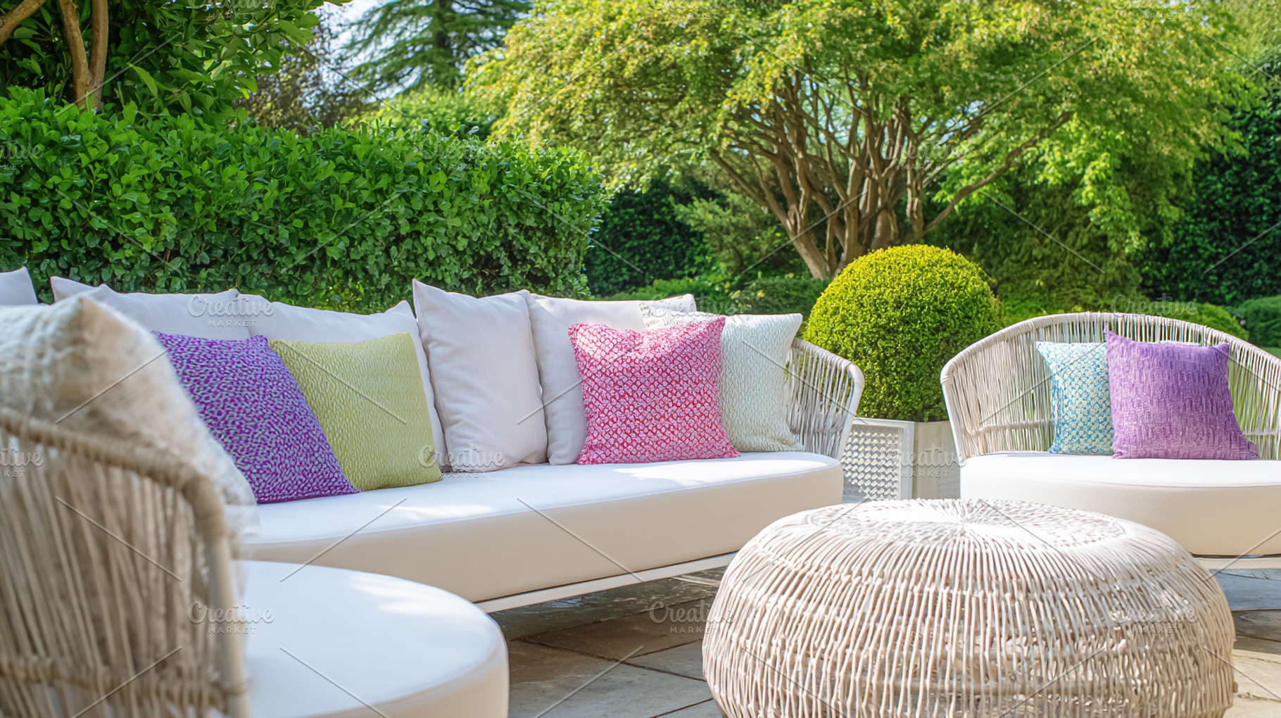 Outdoor patio furniture set on a sunny garden terrace inviting r, a Photo by Studio ANNA