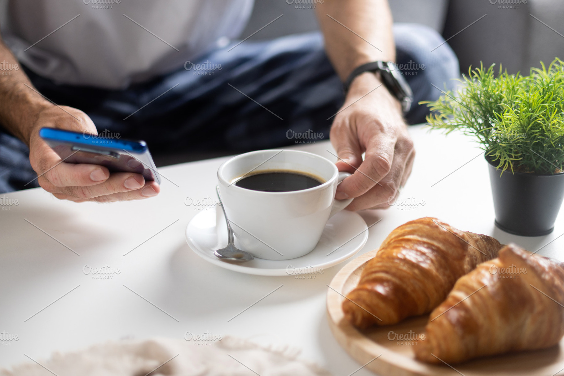 Using Smartphone During Breakfast with Coffee and Croissants, a Food & Drink Photo by etorres69