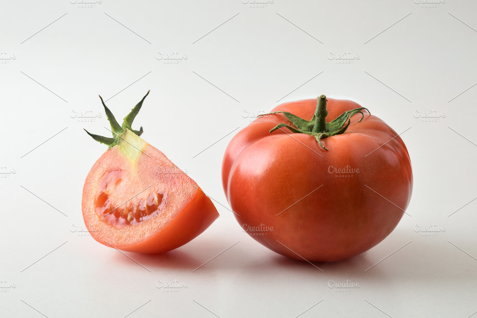Fresh Tomato and Slice Isolated on White, a Food & Drink Photo by Davizro's Market