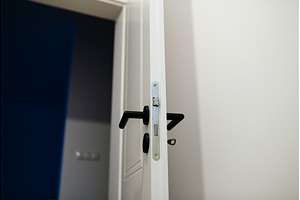 Installing door hardware and handle, an Architecture Photo by HalfPoint