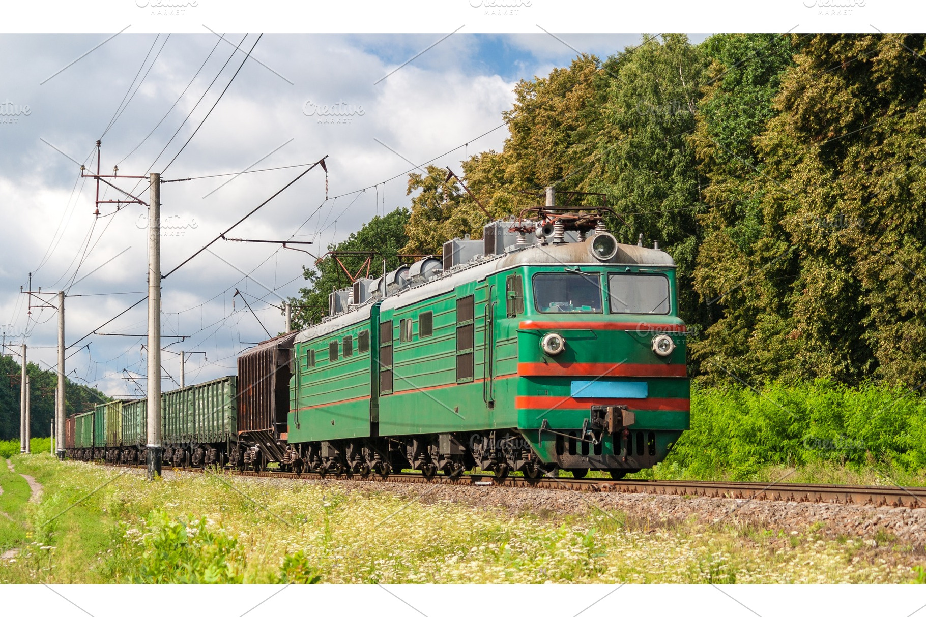 Freight electric train in kyiv region ukraine containing train, electric, and, a Transportation Photo by Leonid Andronov