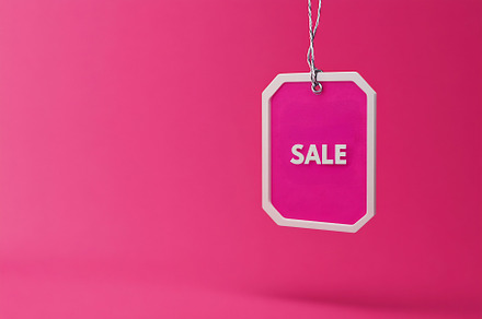 Bright sale tag on pink background, an Arts & Entertainment Photo by Beautiful things