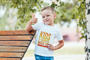 Kids T-Shirt Mock-Up Vol 4, a Shirt Mockup by Freeman Studio (Thumbnail 7 of 14)
