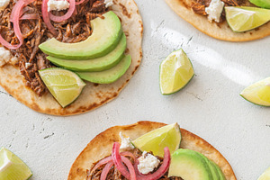 Open faced pulled beef tacos with av, a Food & Drink Photo by Alexander Prokopenko