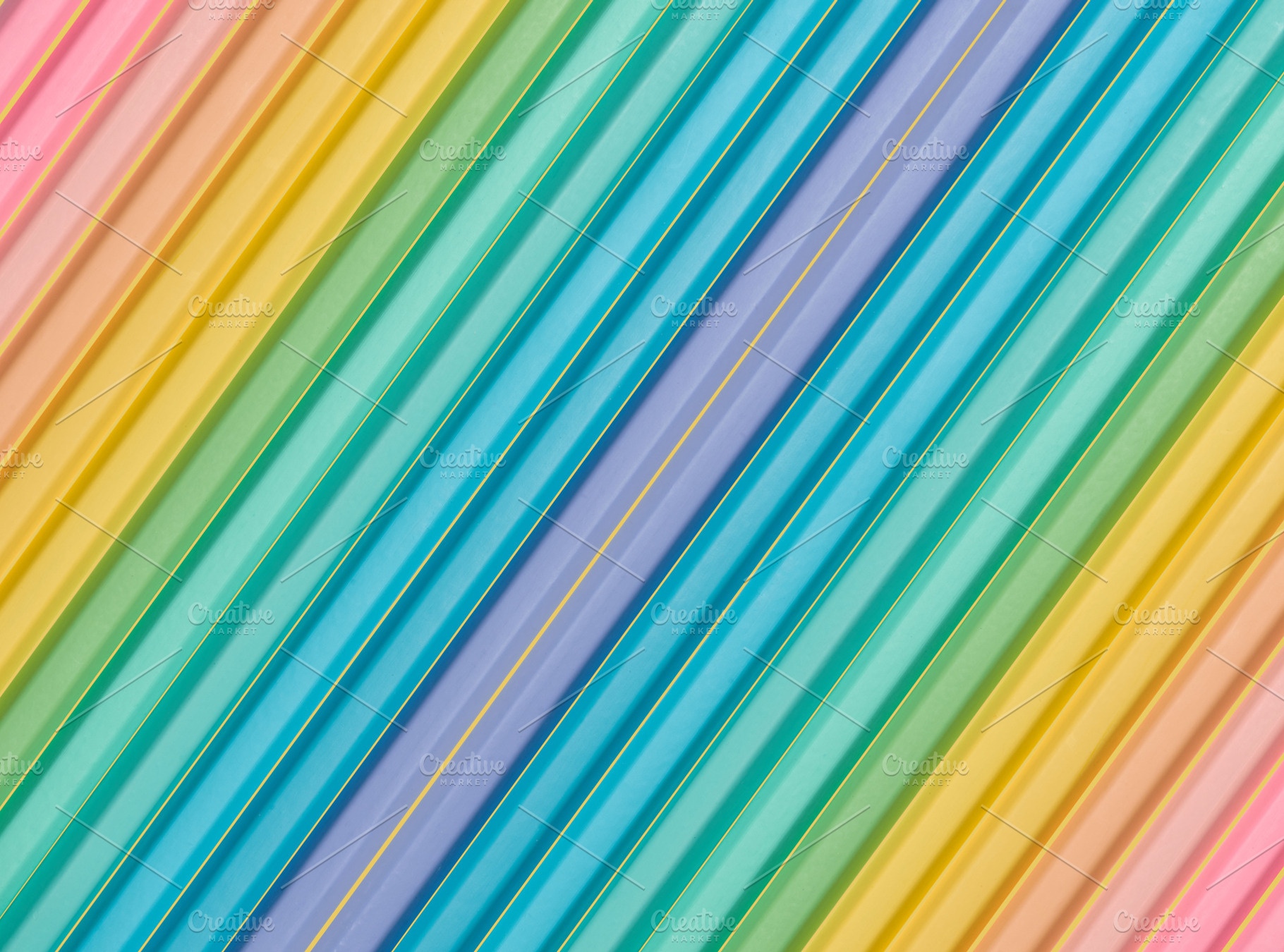 Background of multi-colored wooden pencils, a Background Photo by ndanko