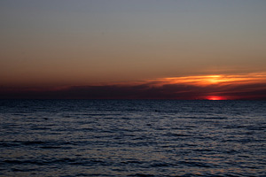 A view of the sea at sunset, a Nature Photo by Schreibikus