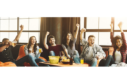 Party of friends football fans featuring adult, alcohol, and ball, a Sports & Recreation Photo by Prostock-Studio