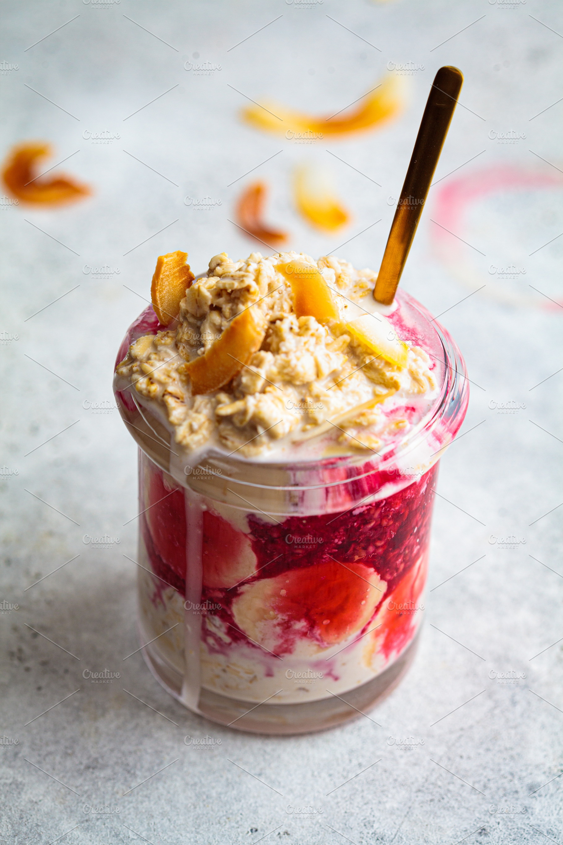 Overnight oatmeal with banana, berry, a Food & Drink Photo by vaaseenaa