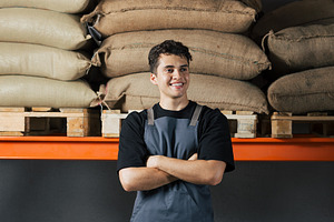 Portrait of a young male in apron, a Person Photo by Artem Varnitsin
