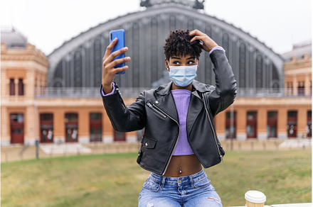 Afro Girl Taking Selfie With Phone