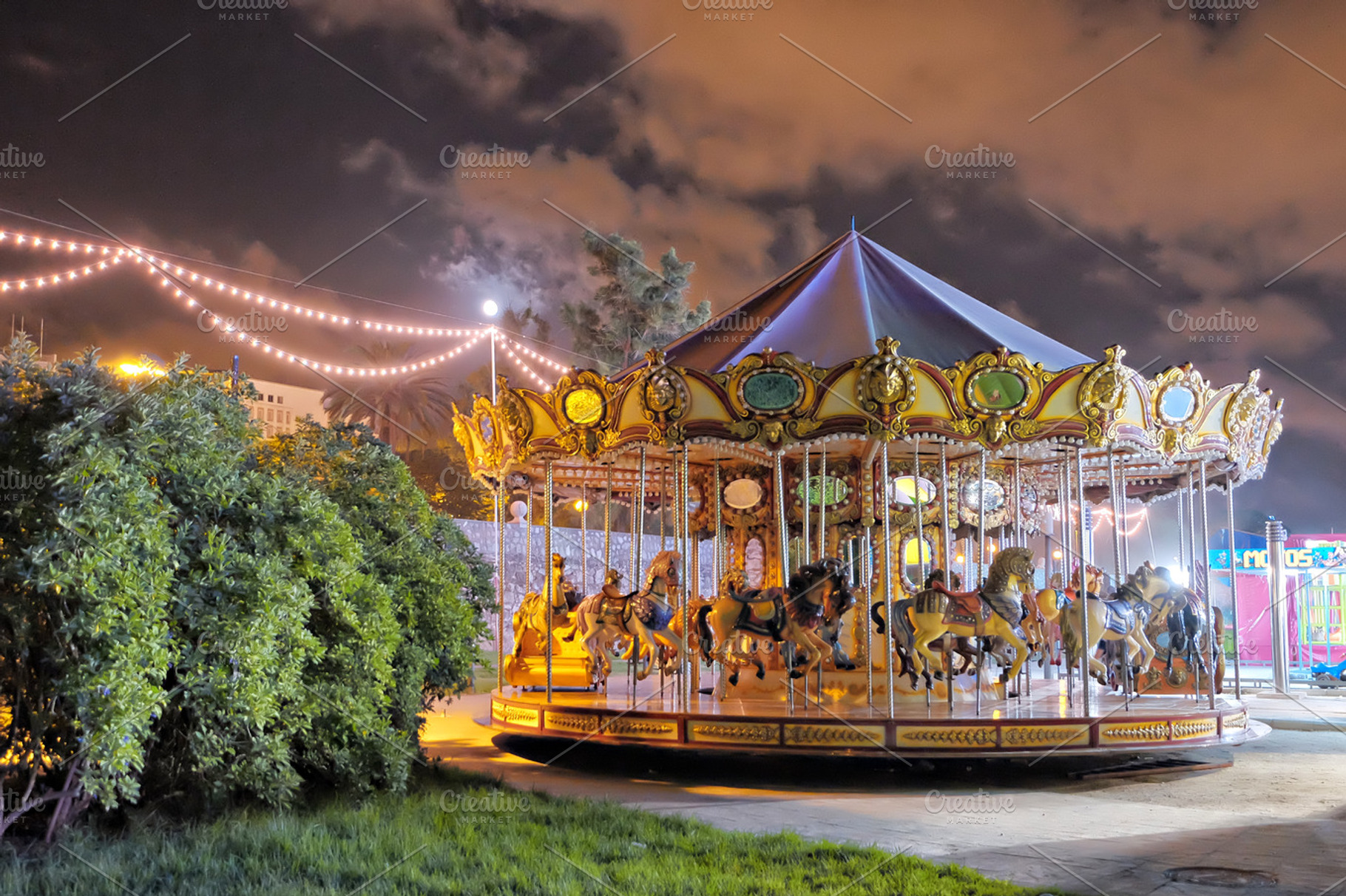 Vintage carousel at night featuring carousel, amusement, and park, an Arts & Entertainment Photo by Kynamuia