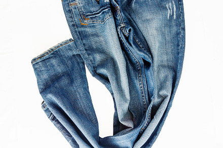 Beautiful casual jeans pants and clothes isolated on white backg, a Beauty & Fashion Photo by TanaCh