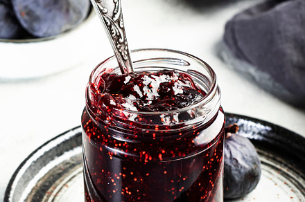 Fig confiture in glass jar. Fresh fruits on gray kitchen table,, a Food & Drink Photo by 5PH