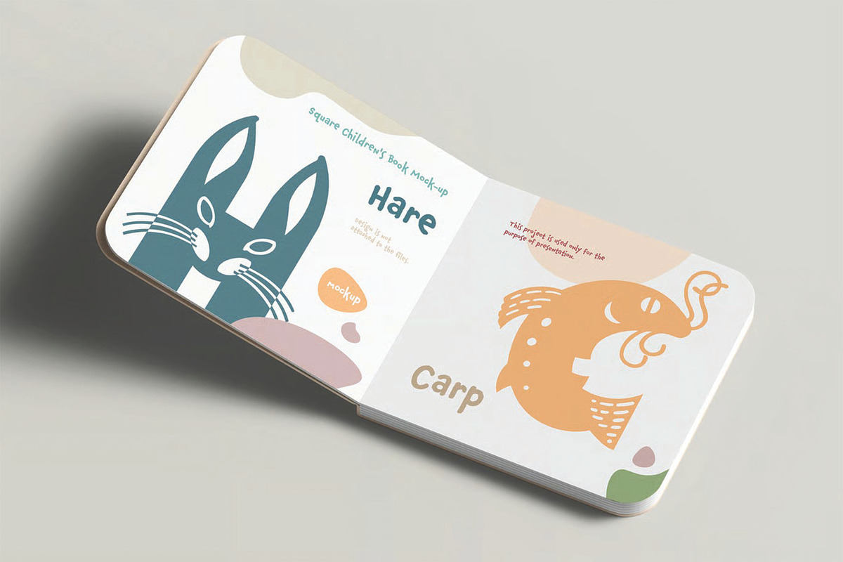 Square Children's Book Mockup, a Books & Magazine Mockup by DesignRushMarket (Photo 8 of 10)