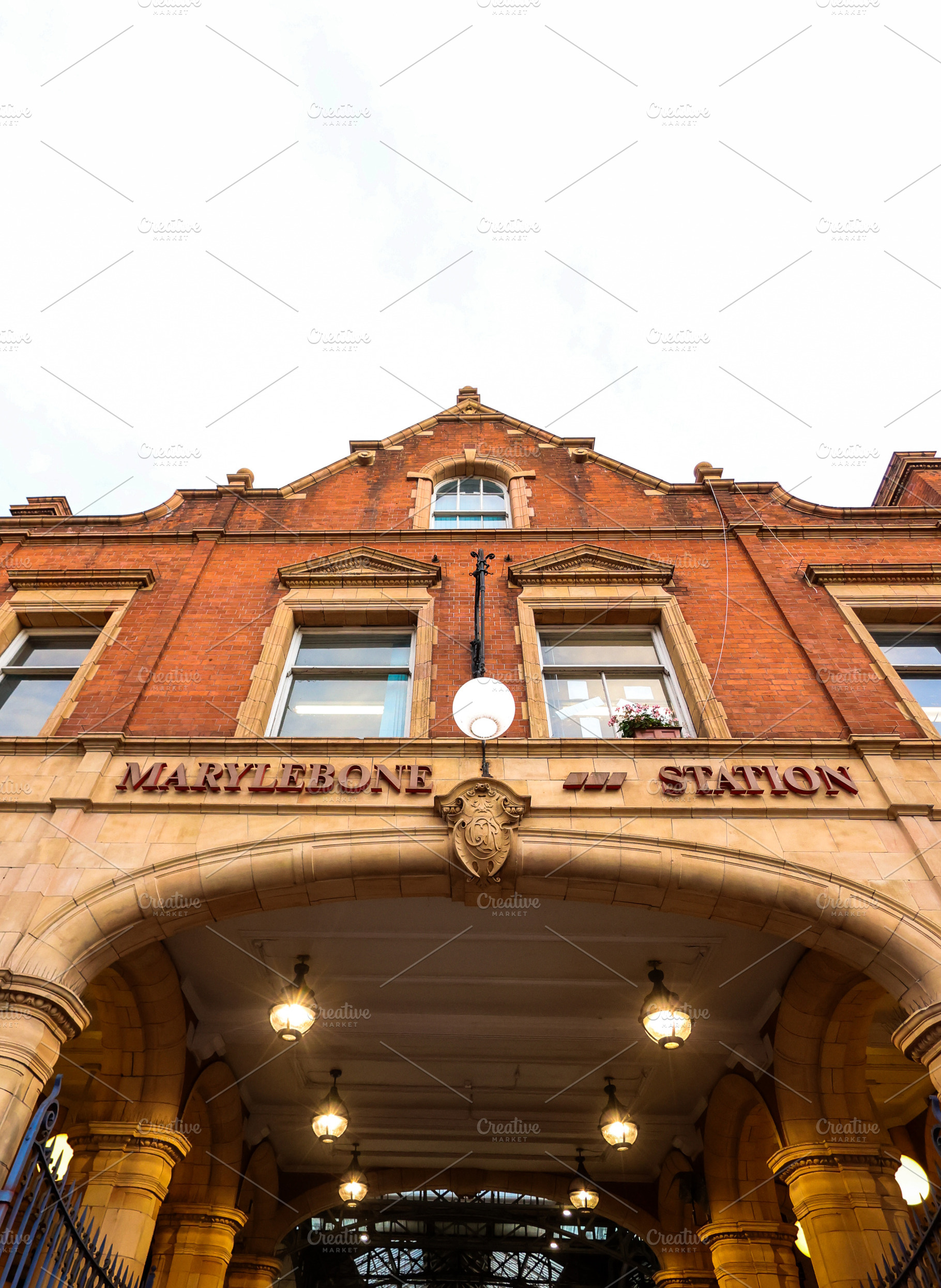 Marylebone Station exterior architecture showing brick facade, stone arches, an, a Photo by Studio ANNA