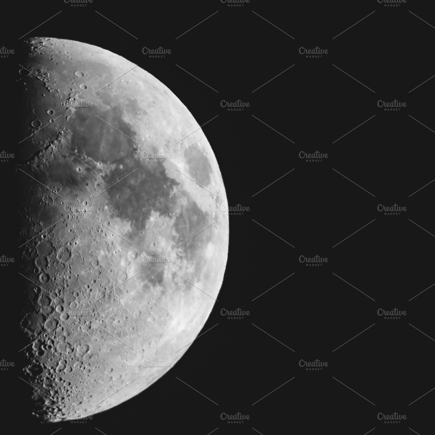 Half moon seen with a telescope, a Photo by WorldOfPhotos