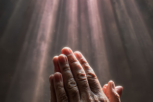 Hands in prayer divine light hope fa, a Photo by Pixeness Studio