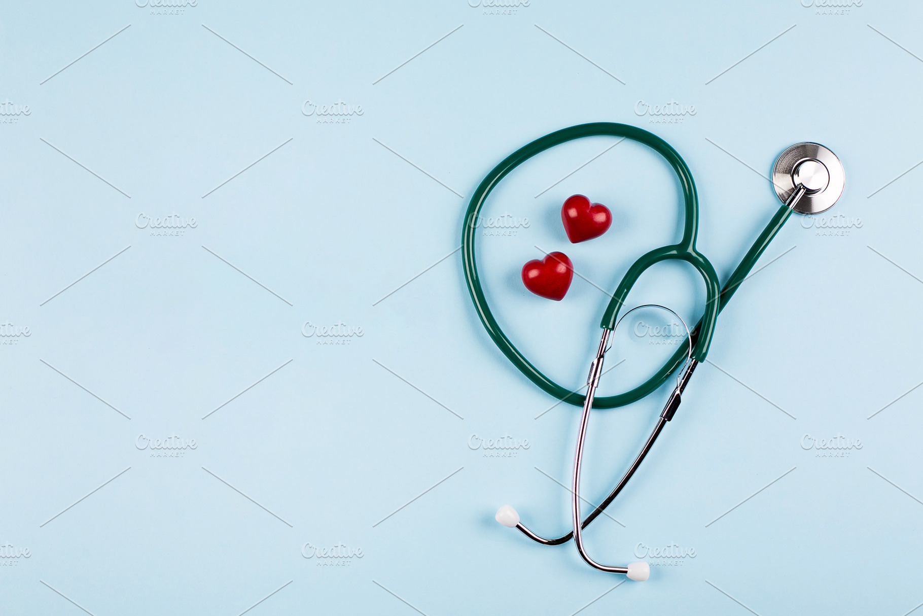 National Nurse Day Holiday Background. Medical stethoscope, two red hearts., a Health & Medical Photo by Anikona