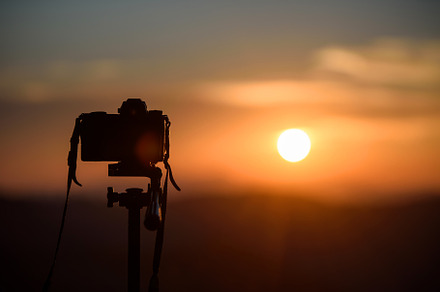 Camera on tripod and photography view with blurred focus mountai, a Nature Photo by Byrdyak