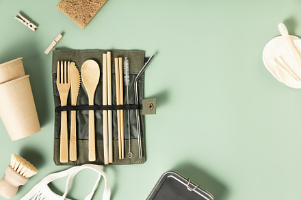 Set of eco-friendly tableware and cleaning products on pastel gr, an Abstract Photo by Natalia Klenova's Shop