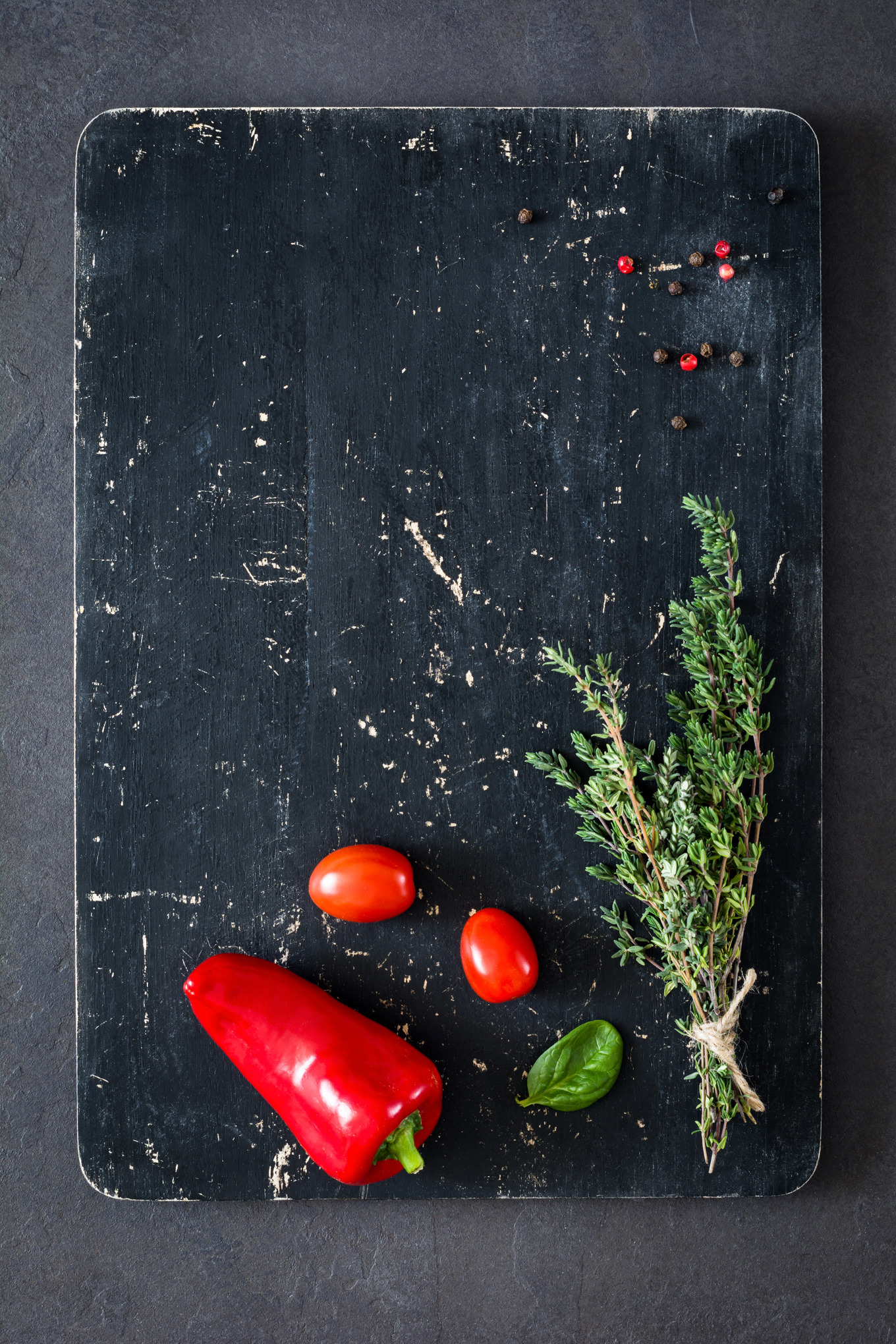 Black cutting board and spices, a Food & Drink Photo by The baking man