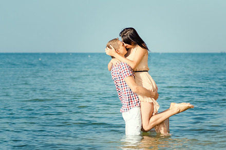 a guy and a girl walk along the seashore, a Person Photo by Weddings, People, Travel