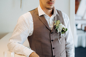 portrait of the groom in a gray suit and an orange vest, a Person Photo by Weddings, People, Travel