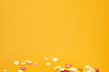 Yellow holiday background with stars featuring christmas, newyear, and xmas