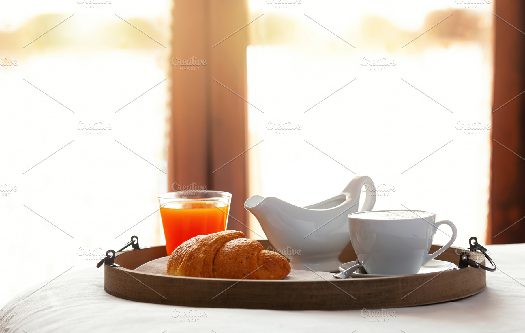 Delicious breakfast with cappuccino, croissant and orange juice served on a tra, a Food & Drink Photo by Antonio Gravante Market