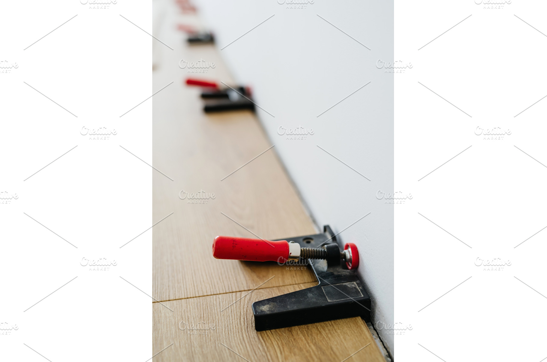 Installing laminate flooring with, an Architecture Photo by HalfPoint