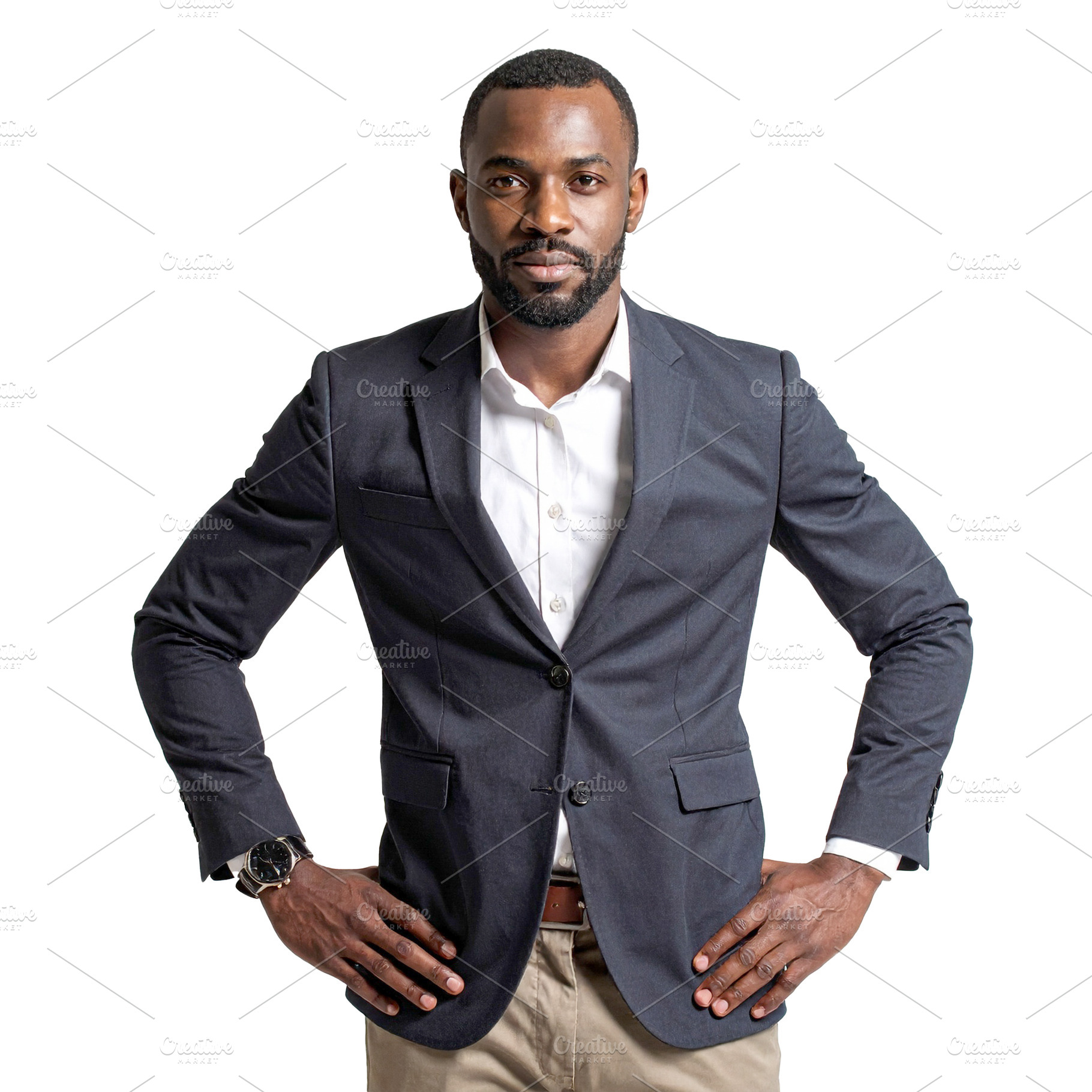 Black man standing in front of a neutral backdrop wearing a bold, a Person Photo by DanFLCreativo