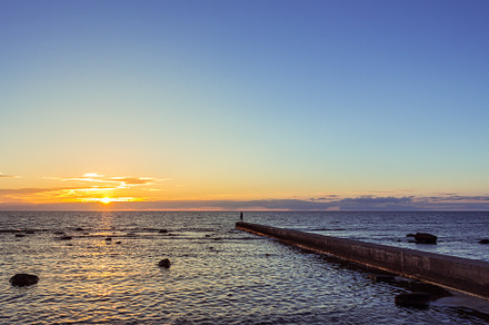 Sunset over the baltic sea in visby containing perspective, sea, and water, a Nature Photo by StripedNadin