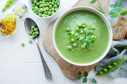 Fresh vegetable soup made of green peas, a Food & Drink Photo by Olena Rudo