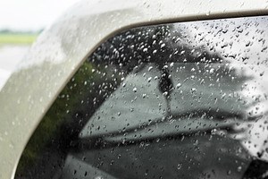 Raindrops on the car, a Transportation Photo by KYNA STUDIO